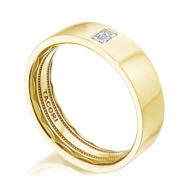 Gender neutral yellow gold bezel set engagement ring