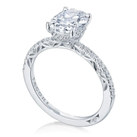Lace like intricate solitaire engagement ring