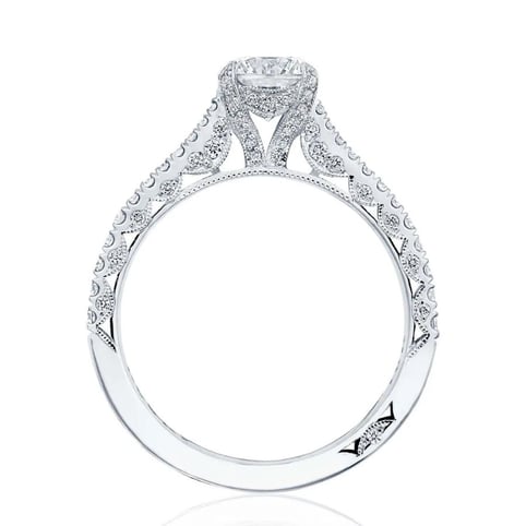 Intricate and diamond studded solitaire engagement ring