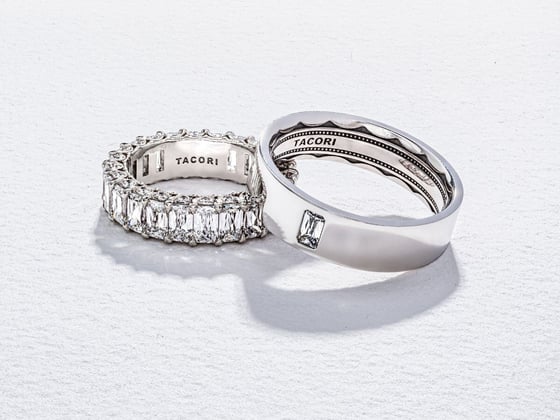 a diamond eternity band paired with a simple bezel set wedding band