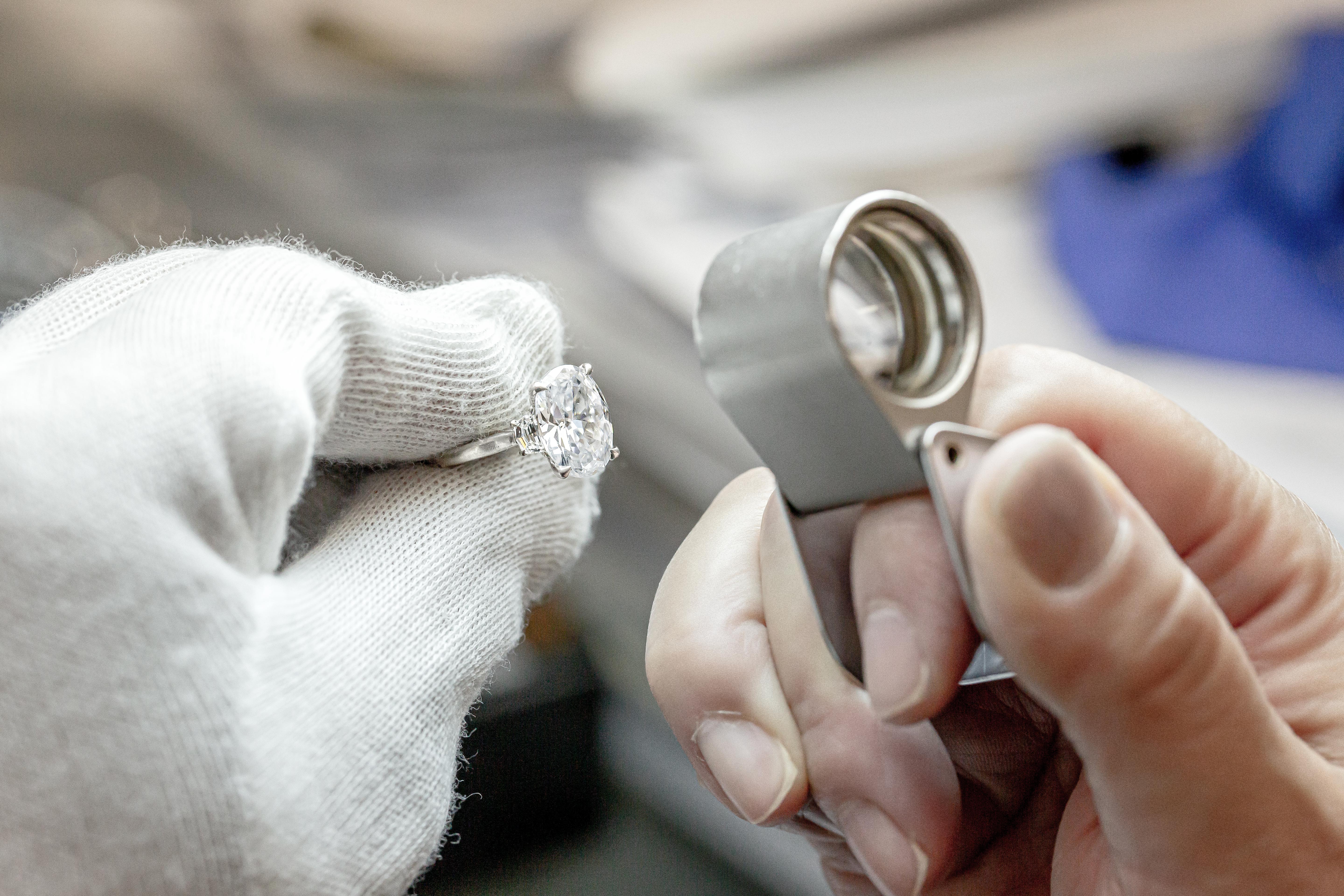 Inspecting a handcrafted TACORI engagement ring